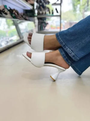Step into effortless style with the Urbantoes Luxe Block Heel Sliders, designed for women who value comfort, durability, and fashion-forward design. Featuring a sleek open-toe silhouette and a sturdy block heel, these sliders provide the perfect balance of height and stability for all-day wear. The cushioned insole ensures maximum comfort, making them ideal for office wear, casual outings, festive occasions, or evening gatherings. Lightweight yet long-lasting, the Luxe Block Heel Sliders can be paired with ethnic wear, dresses, skirts, or trousers to add a chic finishing touch to any outfit. Whether you’re dressing up for a special occasion or elevating your everyday look, these sliders combine modern elegance with practical comfort, making them a versatile must-have in every woman’s footwear collection.